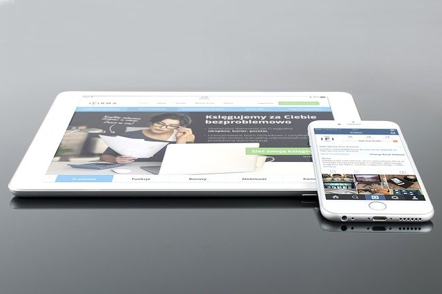 Two websites being displayed on smartphone and tablet